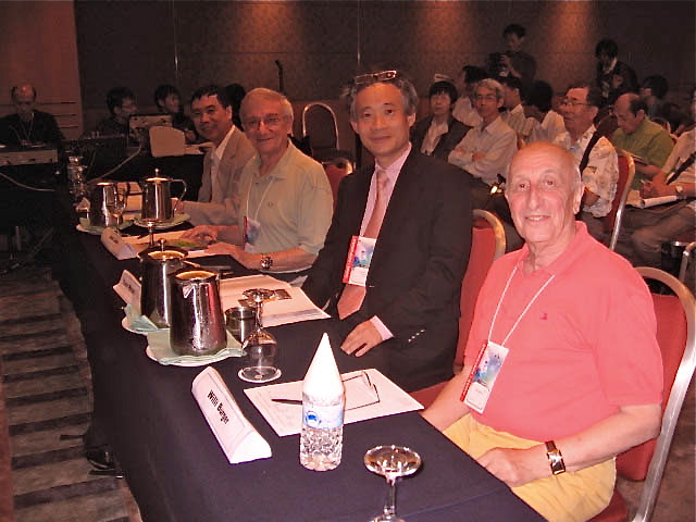 Jury members seated at the competition table in Singapore