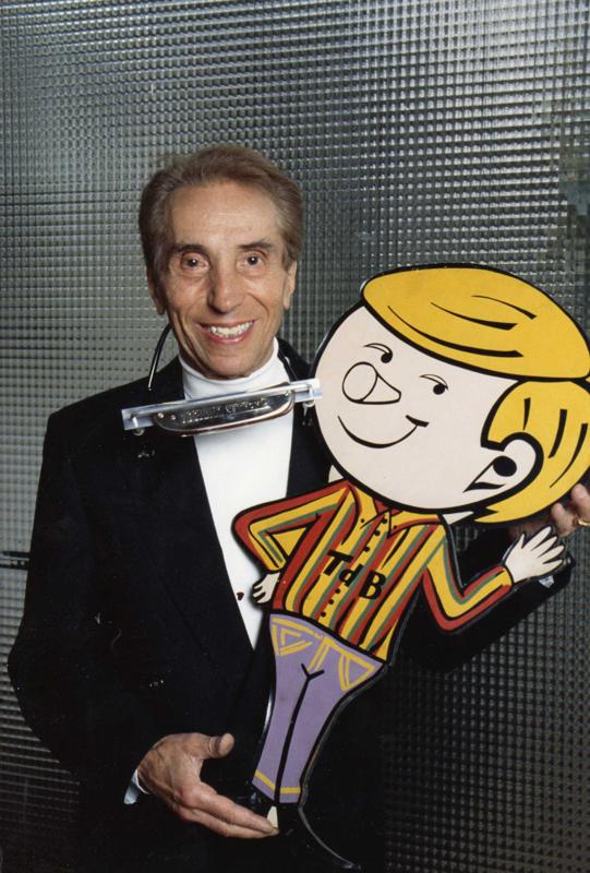 Albert Raisner with Tête de Bois, the cartoon mascot he gave his voice to