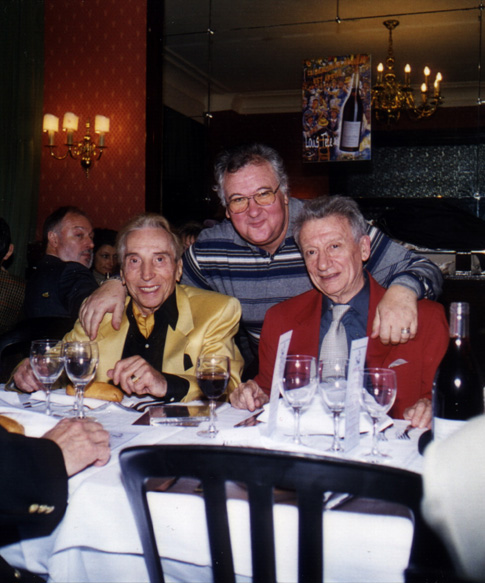 Albert Raisner and harmonica friends gathered at the table for the Harmo-Beaujo meeting